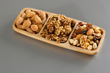  mixed nuts in a bamboo plate