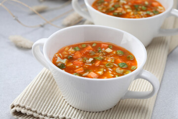 Minestrone Milanese Soup in a white ceramic bowl.