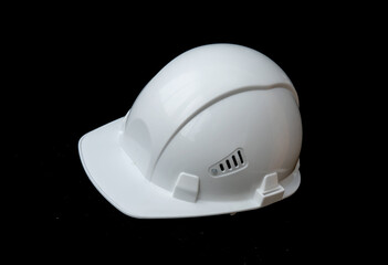 White construction helmet on a black background.