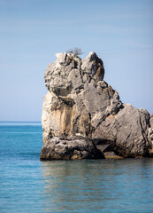 marine nature rocky mountains in the sea against the sky