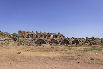 Remains of buildings, the ruins of Devlet Agora in Side, Turkey