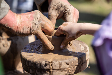 making pottery from clay