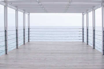 White veranda with access to the sea.