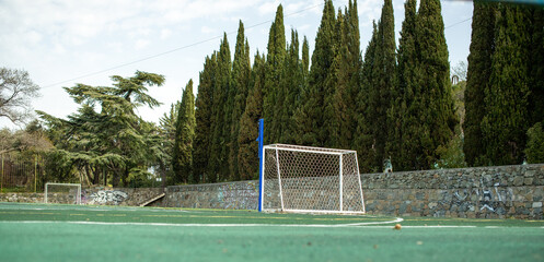 Football field on the background of the sea.