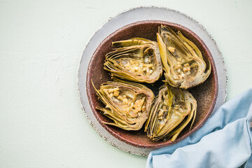 grilled artishoke  flat lay on white background