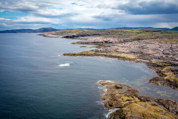 Summer tundra. Rocky coastline of Barents Sea near Teriberka, panoramic aerial view. Scenery of Russian North. Kola Peninsula, Murmansk Oblast, Russia