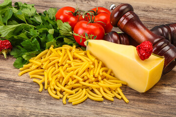 Italian pasta raw Maccheroni for cooking