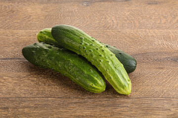 Fersh juicy green cucumbers heap