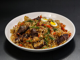 Uzbek traditional plov - rice with meat
