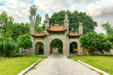 Fototapeta na wymiar Old gate of Chua Nhat Tru Buddhist Temple, Hoa Lu