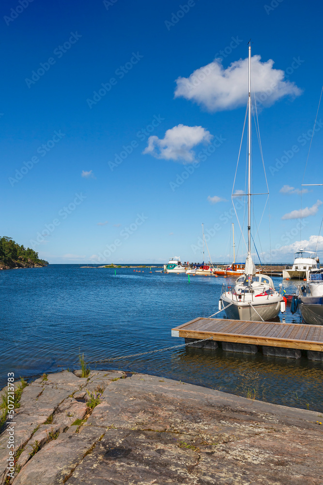 Sticker Leisure boats at a jetty in a lake