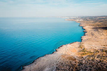 Fototapeta na wymiar Summer landscape in Cyprus. View from the top of Cape Greco. Morning sunrise in Cyprus
