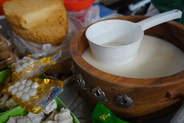 Almaty, Kazakhstan - 03.25.2022 : Sale of fermented milk and cheese products on the open market.