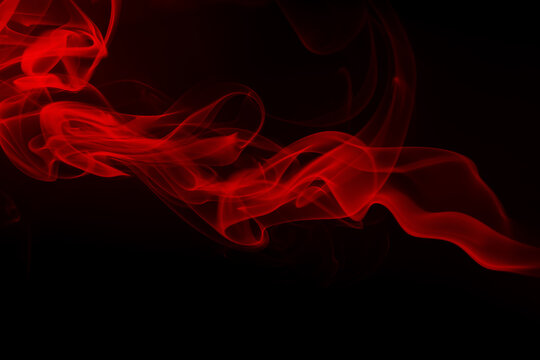 fire of red smoke abstract on black background. darkness concept