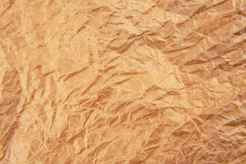 Brown crumpled paper background vignette
