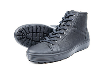 Men's sports leather boots on a white background. Men's sports winter boots with laces.