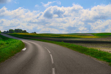 Road through picturesque countryside landscape