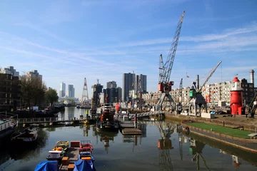 Papier Peint photo autocollant Pont Érasme Old crane in harbor named Leuvehaven in downtwon Rotterdam on sunny day