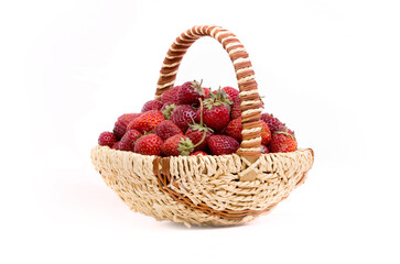 Fototapeta na wymiar Basket with strawberries on a white background. Strawberry close-up isolated. Juicy berries picked for dessert.