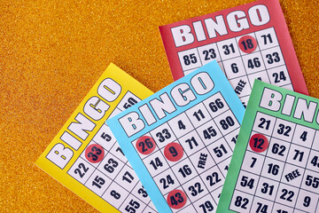 Many colorful bingo boards or playing cards for winning chips. Classic US or canadian five to five...