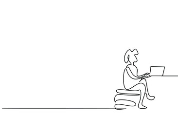 a person comfortably uses a computer laptop at home or in the office