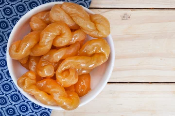 Deurstickers Delicious, golden, syrup drenched South African traditional koeksisters © Aninka
