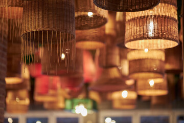 creative plafonds from wicker baskets in the restaurant. plafonds from wooden wicker baskets