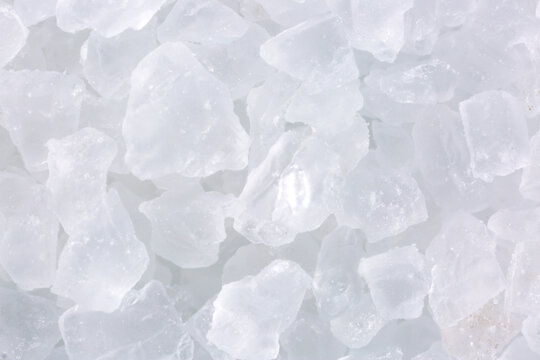 Salt crystals, sea salt as background and texture. Ice crystals