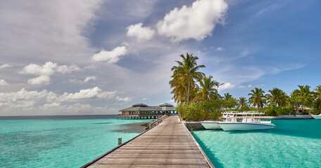 Paradise beaches of the Maldives. Tourism, travel and vacation in a luxury resort - 507227963