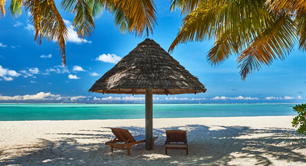 Paradise beaches of the Maldives. Tourism, travel and vacation in a luxury resort - 507227973