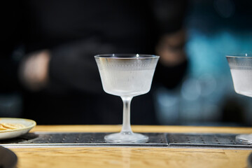 beautiful glass for cocktails on the bar counter close-up