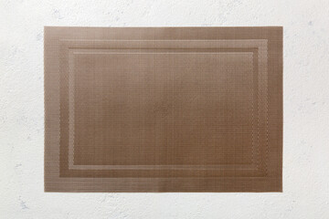 Top view of brown tablecloth for food on cement background. Empty space for your design