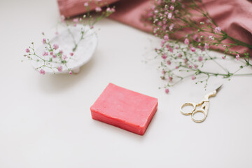 Natural handmade soap bar and flowers, spa organic soap, sustainable lifestyle