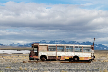 Abandoned lost old bus in nature