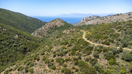 Fototapeta na wymiar Aerial drone shot of the corfu trail on Corfu Greece. Footpath.