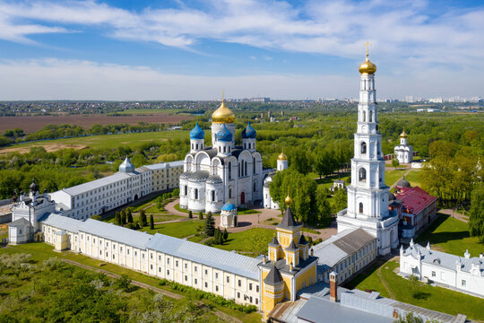 Drone view of Nikolo-Ugreshsky monastery on sunny day. Dzerzhinsky town, Moscow Oblast, Russia.