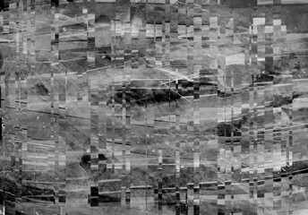 Glitching black and white gritty texture. Distressed grainy design, damaged television or computer screen concept.