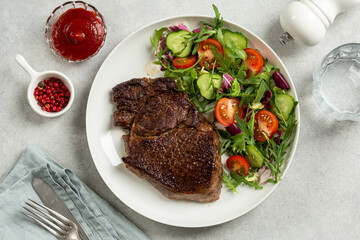 beef steak with fresh vegetable salad