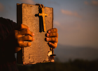 Symbol of God love to people the mountain at sunset