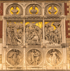 Amsterdam, Netherlands, May 2022. Ornaments on the facade of Central Station in Amsterdam.