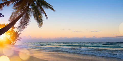 Art Beautiful sunrise over the tropical beach