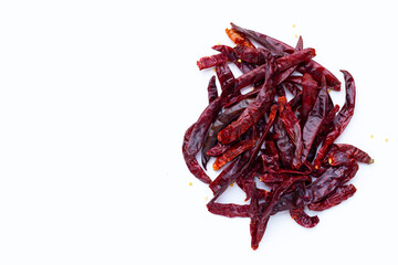 Dried red chili pepper on white background.