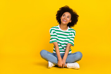 Full body photo of impressed millennial lady sit look promo wear t-shirt jeans footwear isolated on...