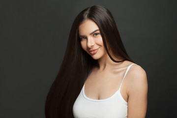 Portrait of a beautiful woman with a long smooth hair