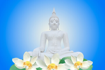 Buddha statue and white lotus on blue background.