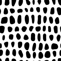 Vector animal skin pattern. Monochrome seamless pattern with reptile or crocodile skin texture. Black and white repeat background with cells, pebble stone mosaic, etc.