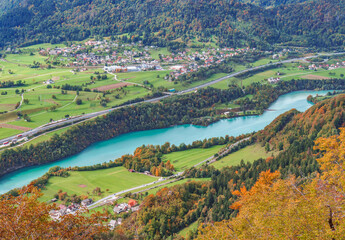 Fototapeta na wymiar Autumn view of the valley, hills, river and mountains