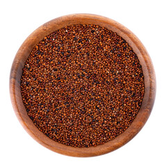 Canihua grains isolated on white background. Pile of qaniwa in wooden bowl. Dry grains of chenopodium pallidicaule. Top view.
