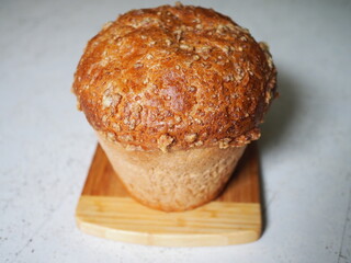 Russian national bread Kalach on a wooden background. National bread products