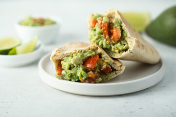 Pita bread sandwich with guacamole